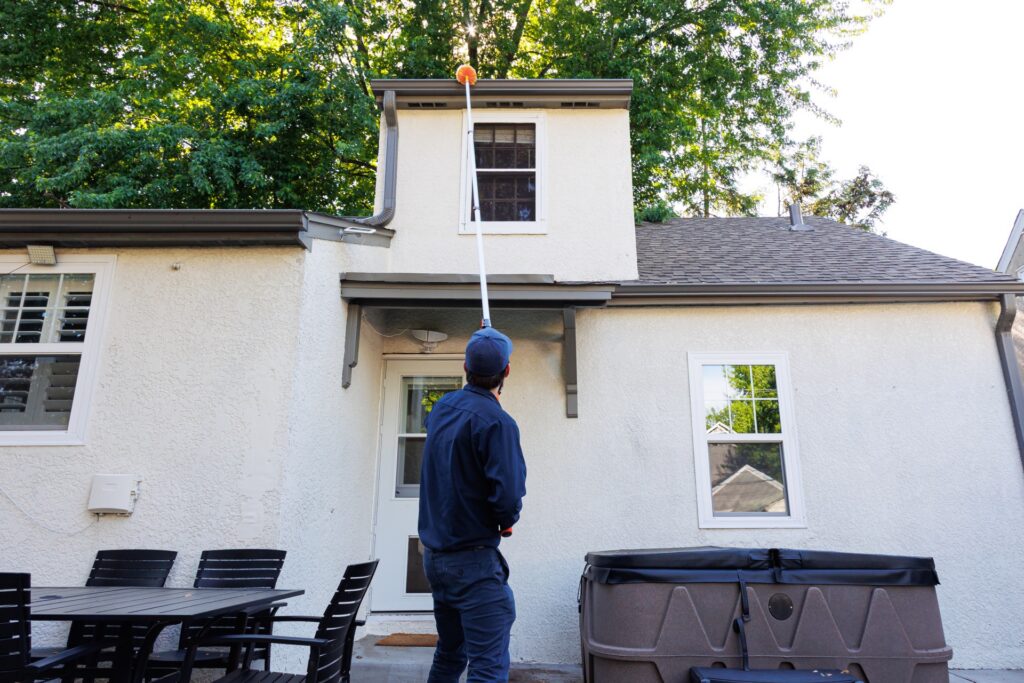 A service technician working on a property